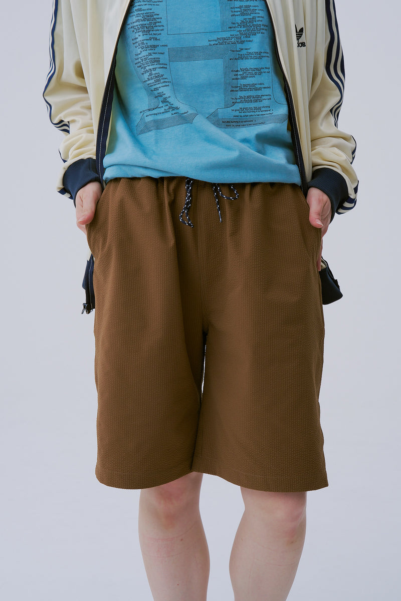 ELIO / BROWN