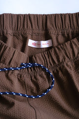 ELIO / BROWN